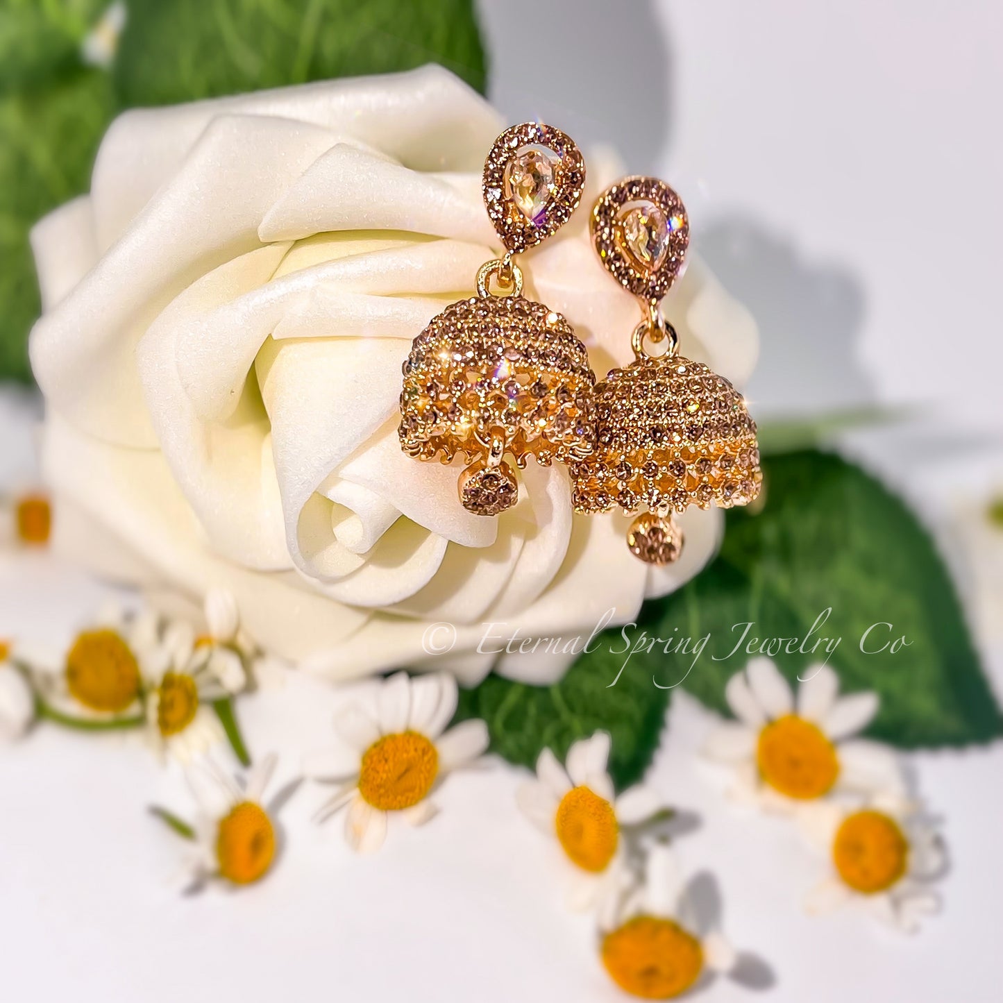 Elegant Golden Jhumka Earrings with Sparkling Champagne Crystals