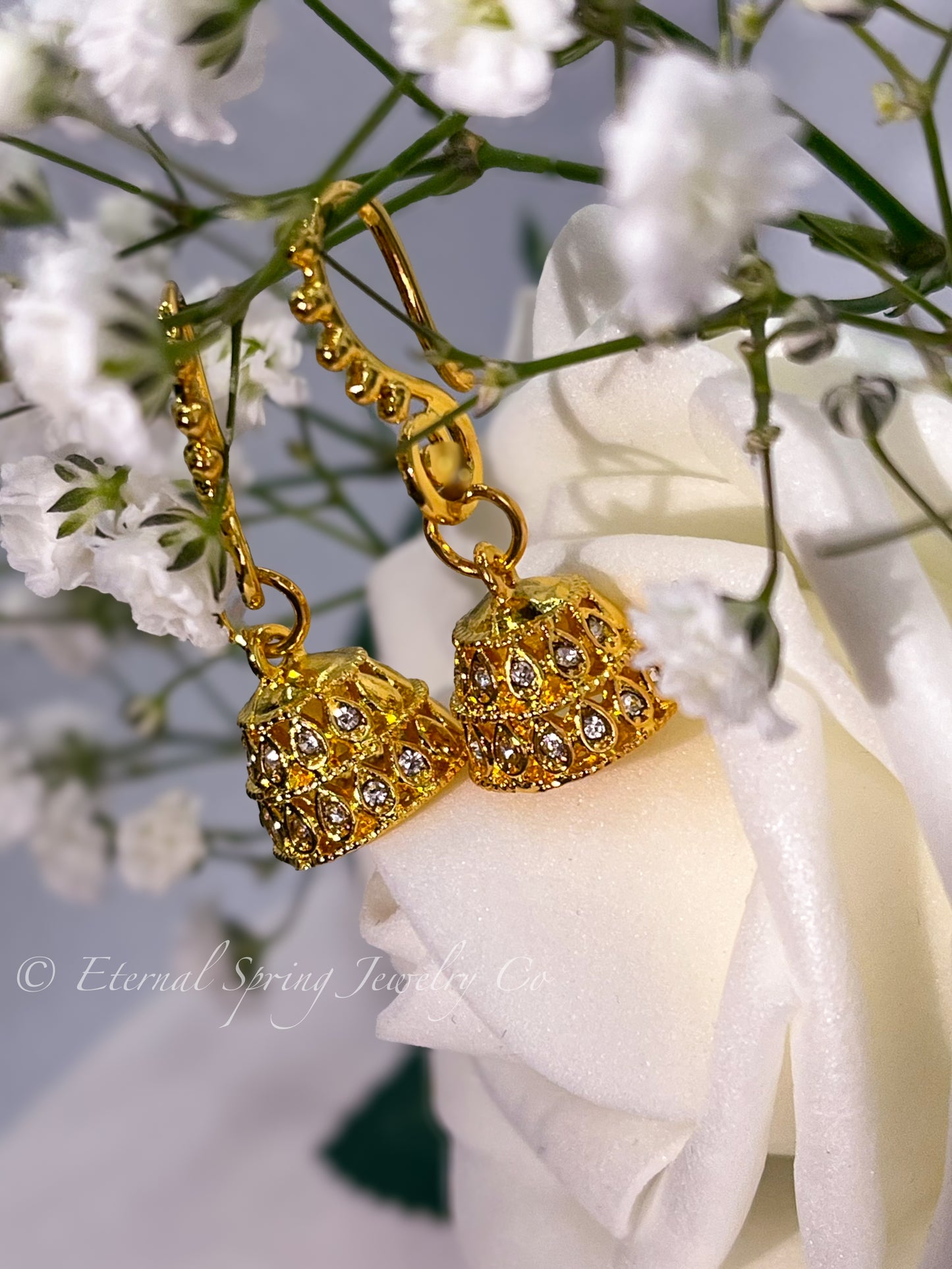 Lightweight, Golden Micro-Jhumka Earrings with Subtle Gold Leaf Pattern & Sparkling Clear Crystals