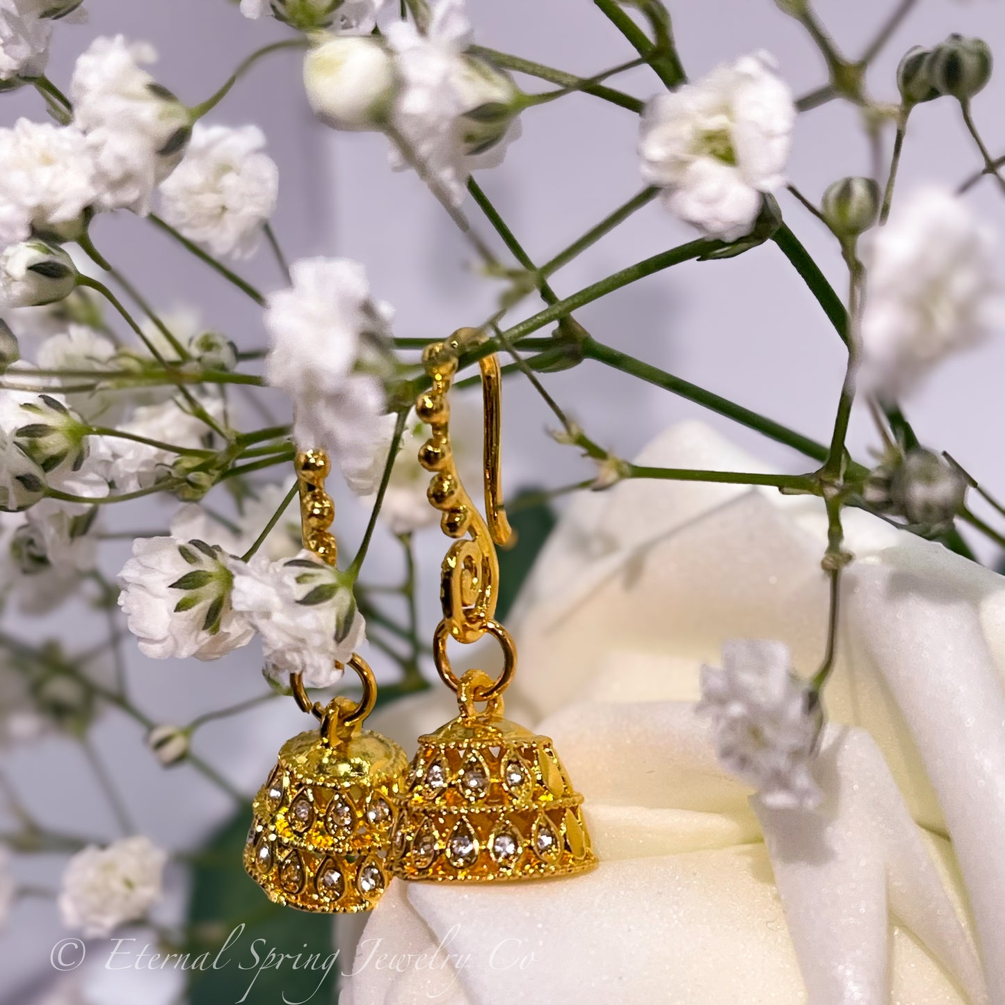 Lightweight, Golden Micro-Jhumka Earrings with Subtle Gold Leaf Pattern & Sparkling Clear Crystals