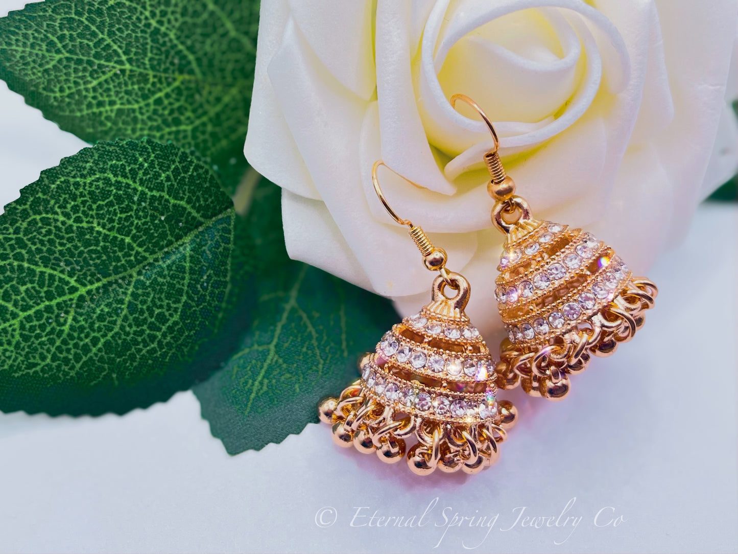 Elegant Golden Jhumka Earrings, Banded with Sparkling Clear Crystals