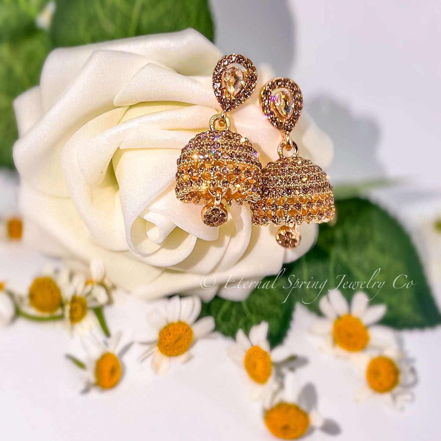 Elegant Golden Jhumka Earrings with Sparkling Champagne Crystals