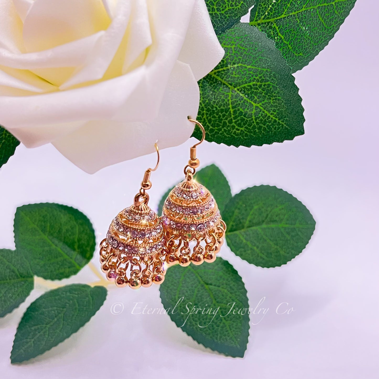 Elegant Golden Jhumka Earrings, Banded with Sparkling Clear Crystals